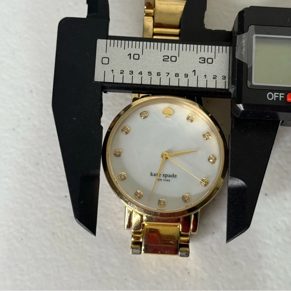 Kate Spade New York Gold Tone Mother of Pearl Crystal Accent‎ Watch